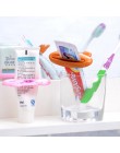 1pc zwierząt łatwy dozownik pasty do zębów plastikowy ząb wklej wyciskacz do tubki przydatne pasta do zębów Rolling Holder dla d