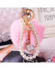2019 moda Pearl Chain butelka kryształowa łuk brelok z pomponem samochód kobiety torebka breloczek na klucze pierścień Fluffy Pu